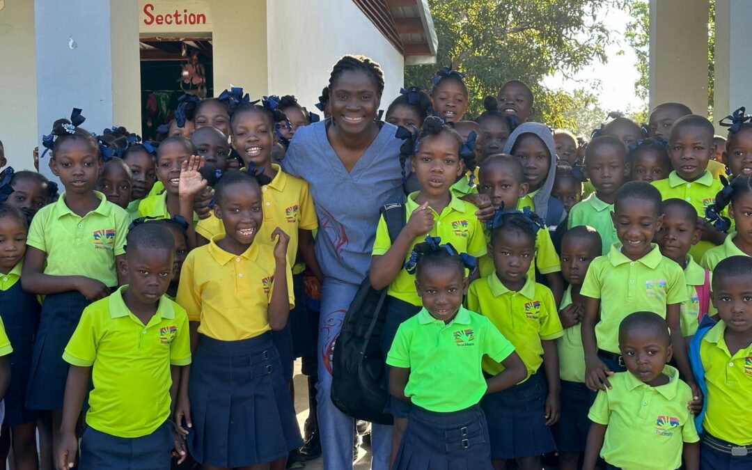 Miquette McMahon with students at Teach Haiti campus